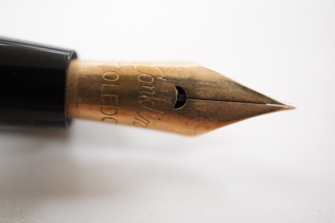 A Sterling silver filigree eyedropper fountain pen, fitted with Conklin Toledo nib